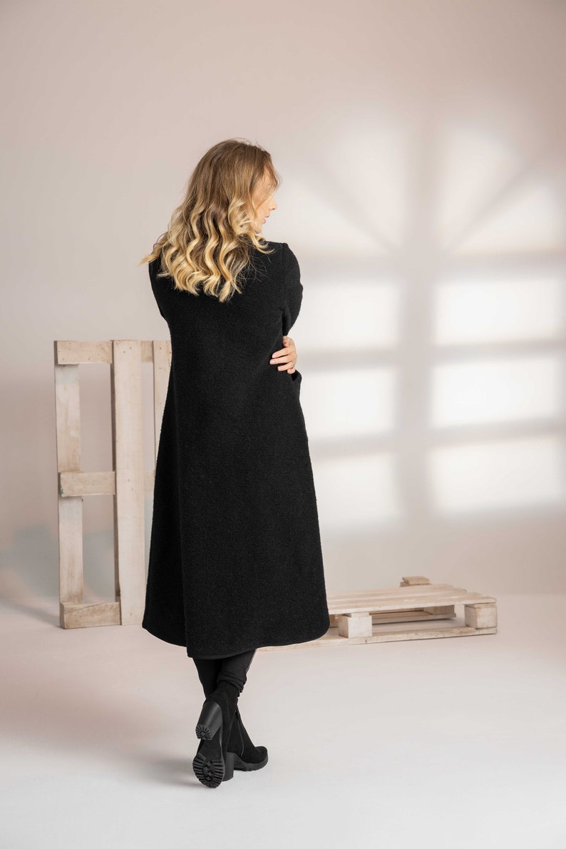 Tailored black boiled wool coat for a feminine fit - from NikkaPlace | Effortless fashion for easy living